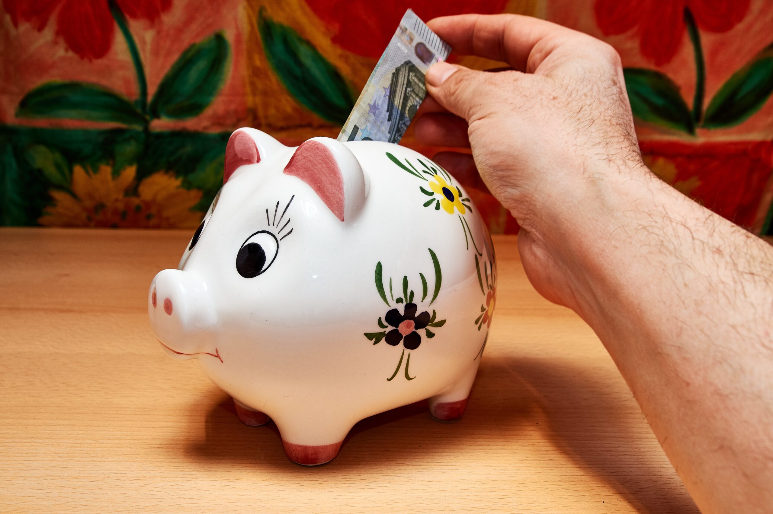 Saving money every month on a low income